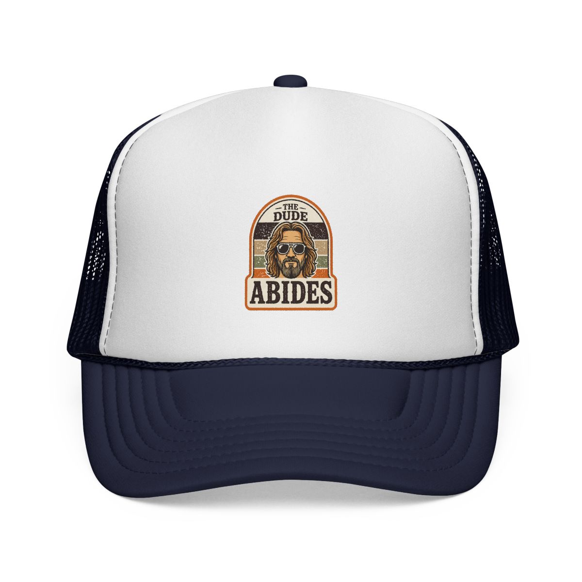 A brown and white trucker hat with a patch that says "The Dude Abides" and features a cartoon image of a man wearing sunglasses - alternate angle 3, merchandise